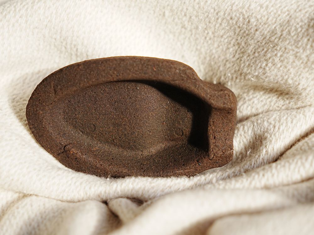 A freshly moulded shoe tree showing its hollow form